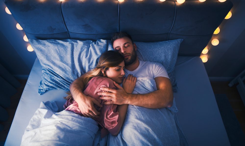 Lovely,Young,Couple,Sleeping,Tight,In,Bed.,It's,Early,Morning.