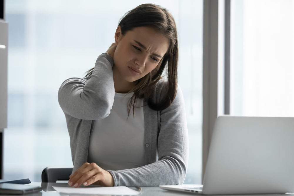 Desk,Job,Problems.,Tired,Unhealthy,Young,Woman,Spending,Day,In,Spoils posture