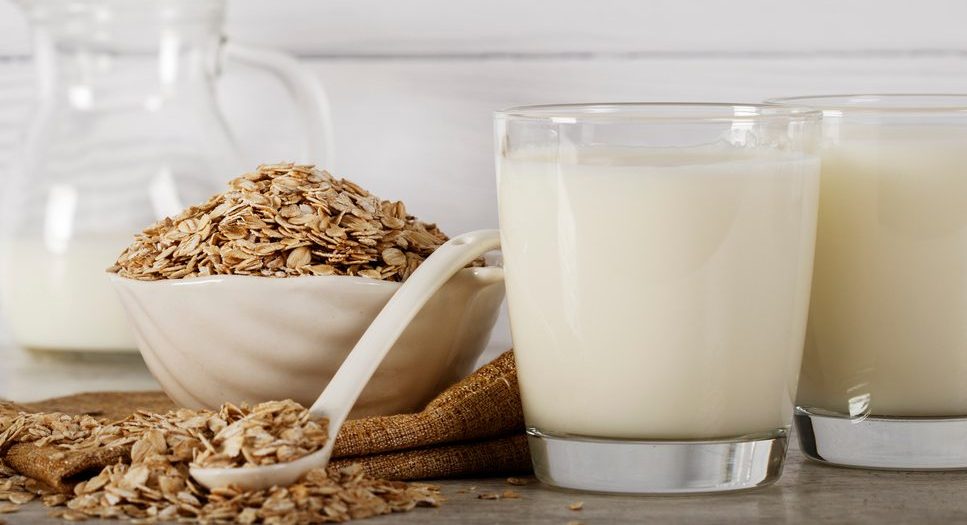 Oatmeal,In,A,White,Bowl,With,A,Glass,Of,Milk,Nutrition