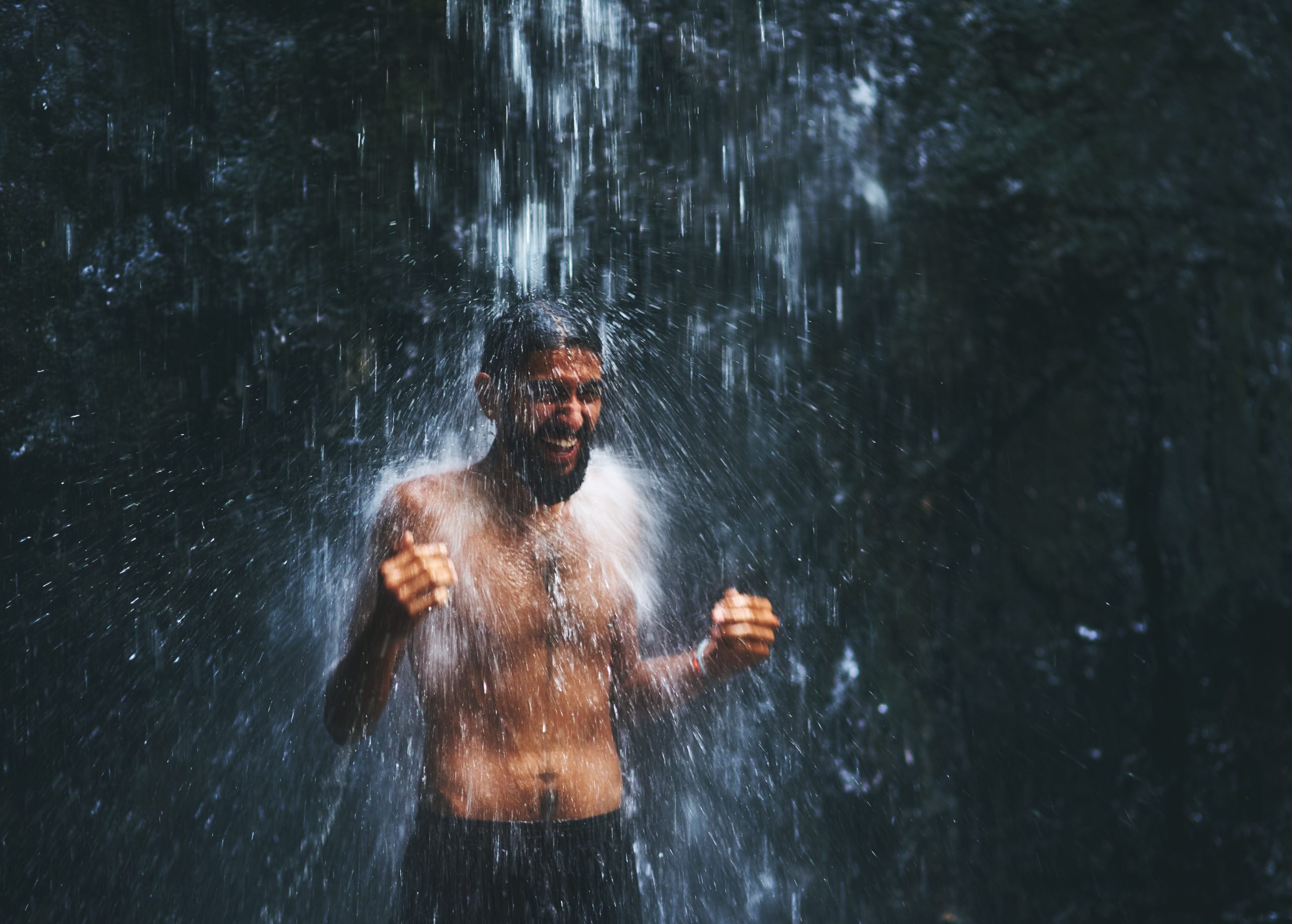 Cold,But,Great.,Shot,Of,A,Young,Man,Standing,Under