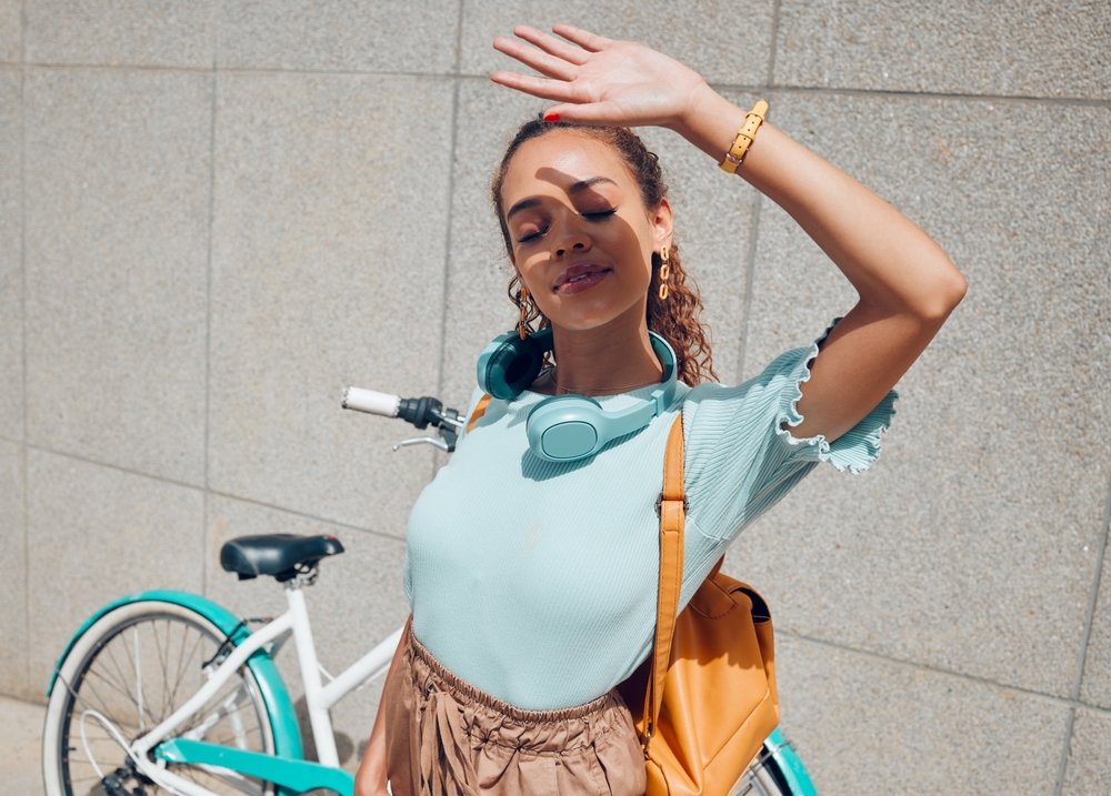 City,,Girl,And,Hand,Shield,For,Sun,Exposure,On,Outdoor