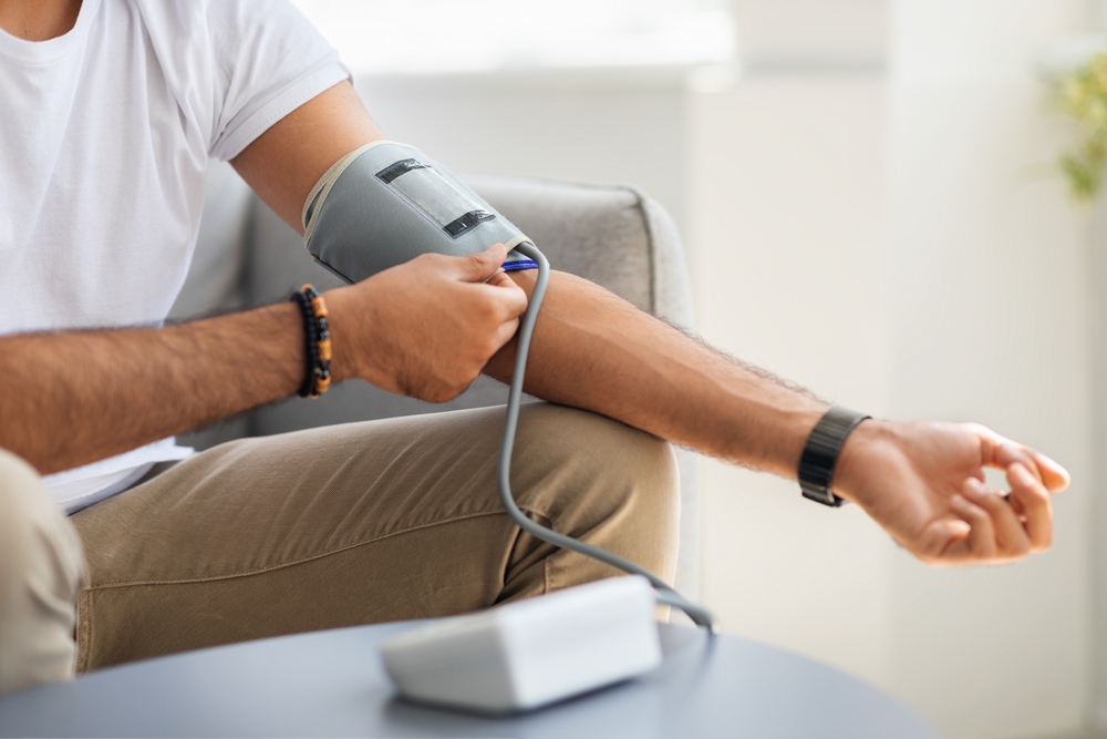 Closeup,Of,Unrecognizable,Male,Patient,Using,Modern,Tonometer,At,Home,