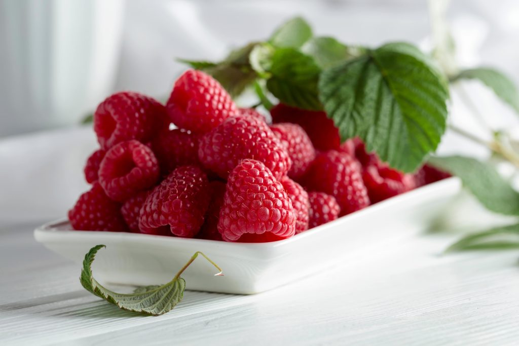 berry,fruit,pile,snack,whole,freshness,raspberries,branch,summer,agriculture,red,white,vegetarian,ripe,season,wood,diet,herb,organic,table,group,raspberry,antioxidant,harvest,green,ingredient,herbal,natural,raw,vegan,juice,leaf,delicious,food,vitamin,nutrition,dessert,closeup,dish,light,background,healthy,plant,juicy,tasty,fresh,sweet;