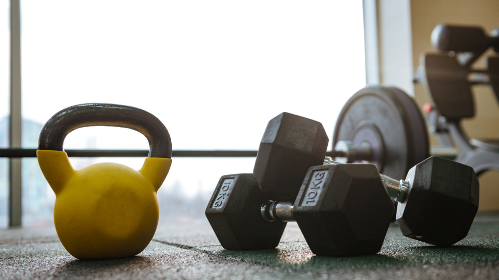 Photo,Of,Sport,Equipment,In,Gym.,Dumbbells,On,Floor.