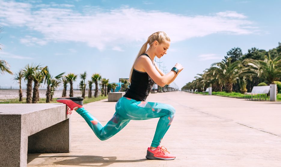 Young,Woman,Has,An,Outdoor,Workout,On,The,Sea,Embankment