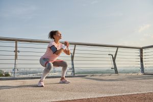 Determined,Middle,Aged,Sportswoman,,Female,Athlete,Exercising,Outdoor,At,Sunrise,