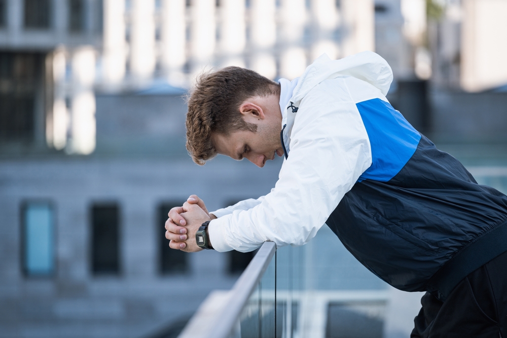 Profile,Portrait,Of,Young,Tired,Athlete,Resting,After,Hard,Training