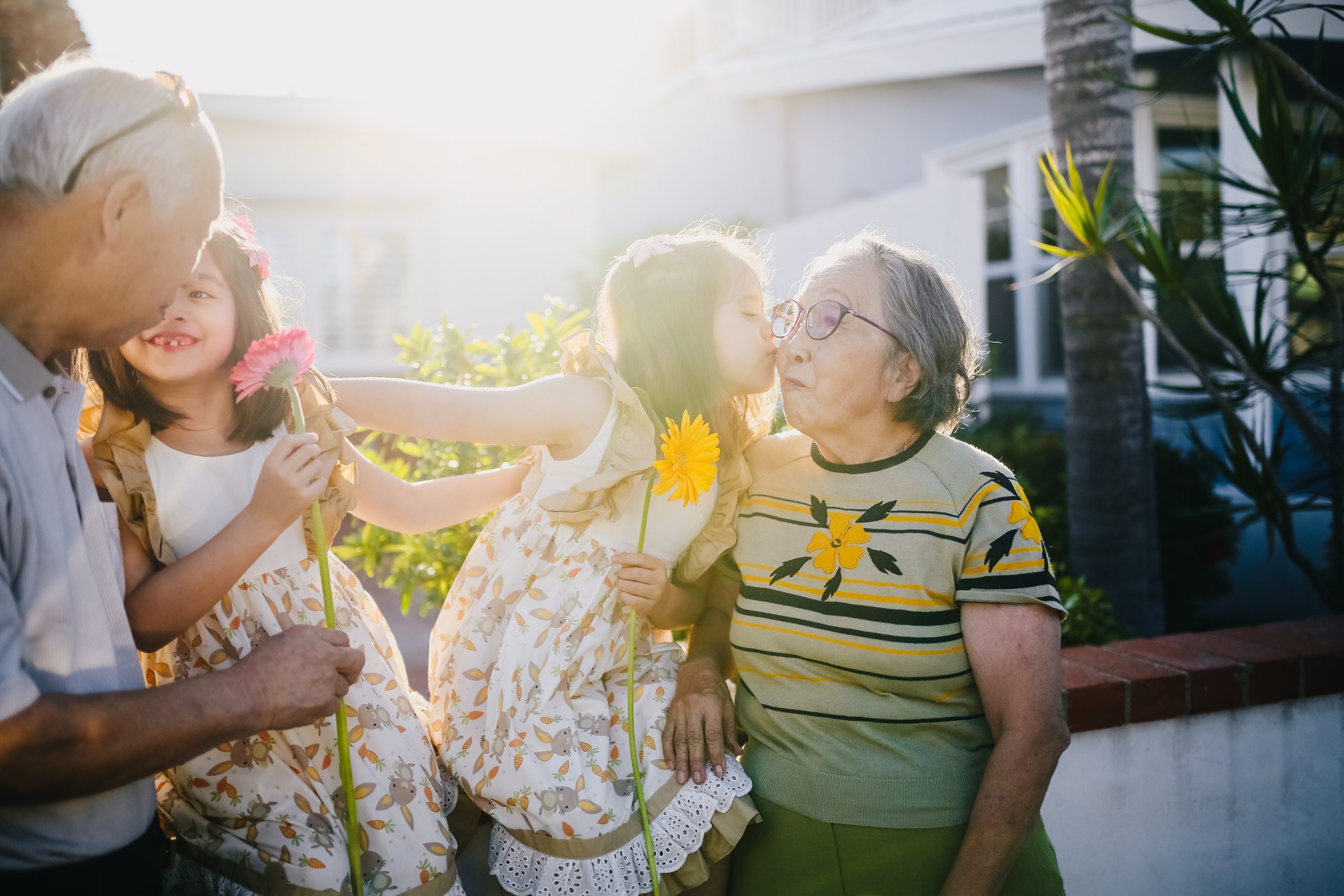 elderly people with kids family happy