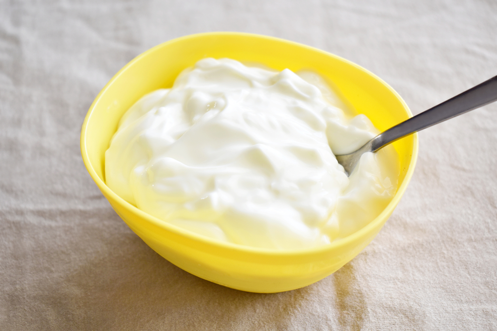 Greek,Yogurt,On,A,Yellow,Bowl.,Selective,Focus.